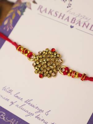 Golden bead cluster traditional rakhi with roli chawal capsules 4