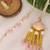 Blush pearl tassel bhai bhabhi rakhi lumba set with roli chawal capsules