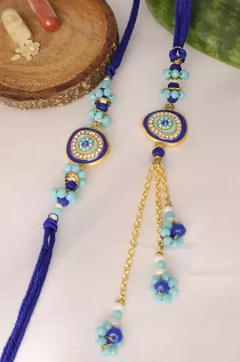 Blue evil eye bhai bhabhi rakhi lumba set with roli chawal capsules