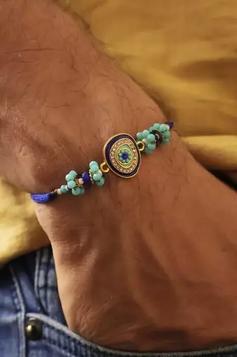 Blue evil eye bhai bhabhi rakhi lumba set with roli chawal capsules