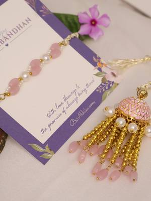 Blush pearl tassel bhai bhabhi rakhi lumba set with roli chawal capsules 5