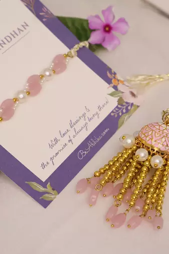 Blush pearl tassel bhai bhabhi rakhi lumba set with roli chawal capsules