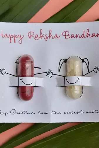 Emerald pearl bhai bhabhi rakhi lumba set with roli chawal capsules