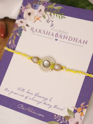 Pearl kundan halo designer rakhi with roli chawal capsules 2