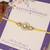 Pearl kundan halo designer rakhi with roli chawal capsules