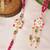 Pink floral pearl bhai bhabhi rakhi lumba set with roli chawal capsules