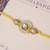 Pearl kundan halo designer rakhi with roli chawal capsules