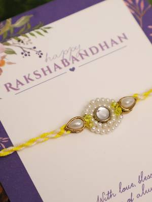Pearl kundan halo designer rakhi with roli chawal capsules 4