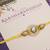 Pearl kundan halo designer rakhi with roli chawal capsules