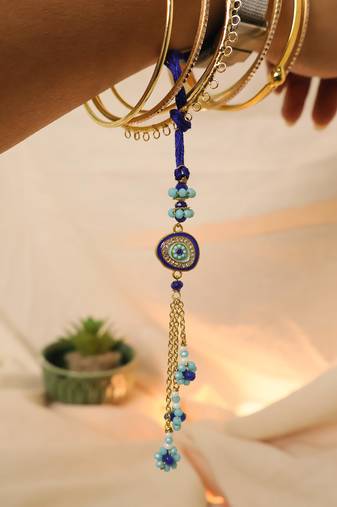 Blue evil eye floral tassel lumba with roli chawal capsules