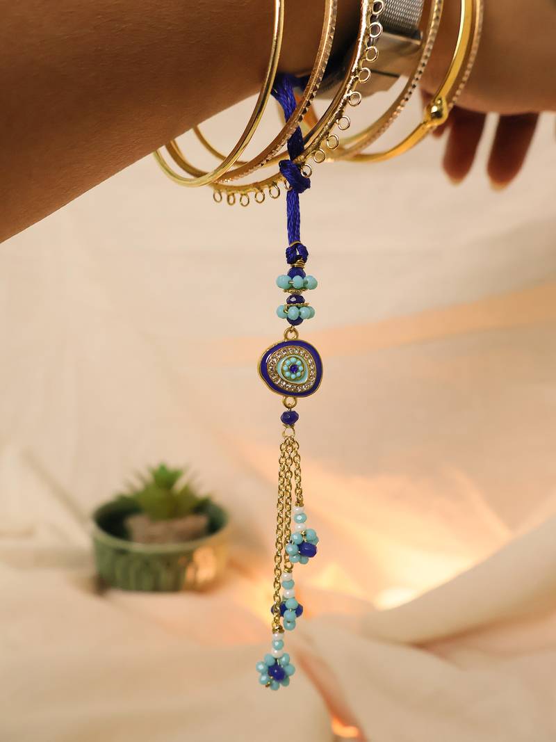 Blue evil eye floral tassel lumba with roli chawal capsules