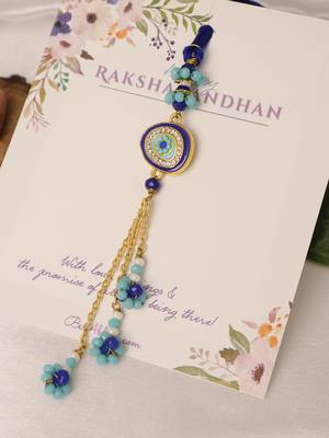 Blue evil eye floral tassel lumba with roli chawal capsules 2