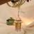 Blush pearl jhumki tassel designer lumba with roli chawal capsules