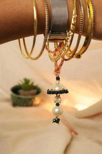 Teal floral pearl drop designer lumba with roli chawal capsules