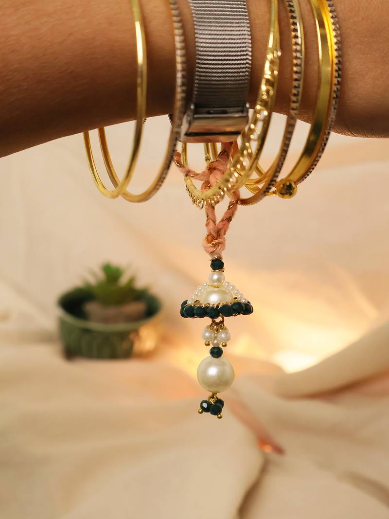Teal floral pearl drop designer lumba with roli chawal capsules