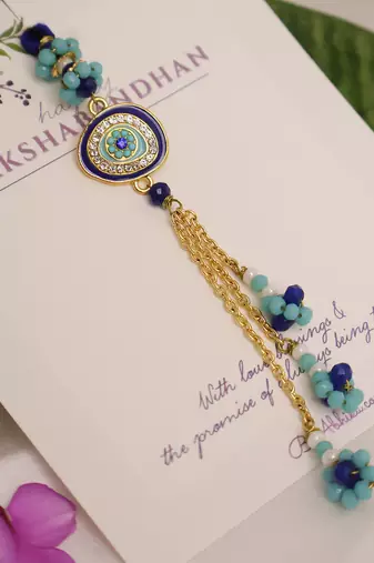 Blue evil eye floral tassel lumba with roli chawal capsules