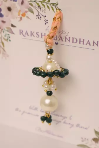 Teal floral pearl drop designer lumba with roli chawal capsules