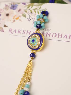 Blue evil eye floral tassel lumba with roli chawal capsules 4