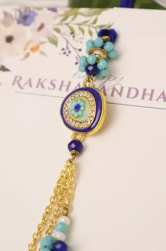 Blue evil eye floral tassel lumba with roli chawal capsules