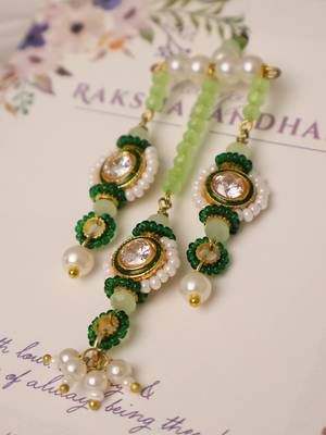 Emerald kundan pearl tassel designer lumba with roli chawal capsules 3