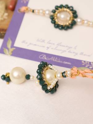 Teal floral pearl drop designer lumba with roli chawal capsules 3