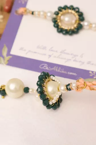 Teal floral pearl drop designer lumba with roli chawal capsules