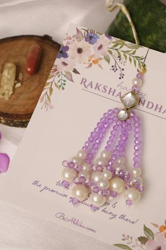 Lavender pearl tassel beaded designer lumba with roli chawal capsules