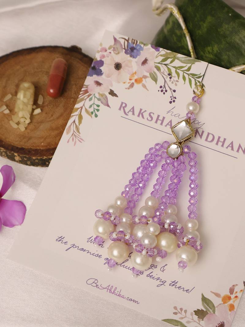 Lavender pearl tassel beaded designer lumba with roli chawal capsules