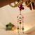 Pink floral pearl tassel designer lumba with roli chawal capsules