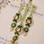 Emerald kundan pearl tassel designer lumba with roli chawal capsules