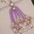 Lavender pearl tassel beaded designer lumba with roli chawal capsules