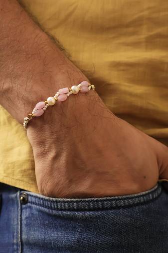Pink pearl beaded designer rakhi with roli chawal capsules