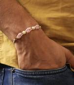 Pink pearl beaded designer rakhi with roli chawal capsules