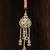 Pastel kundan tassel pearl charm lumba with roli chawal capsules