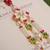 Pink floral pearl tassel designer lumba with roli chawal capsules