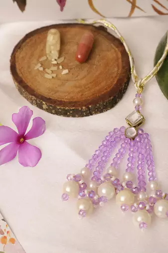 Lavender pearl tassel beaded designer lumba with roli chawal capsules