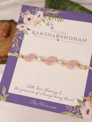 Pink pearl beaded designer rakhi with roli chawal capsules 2