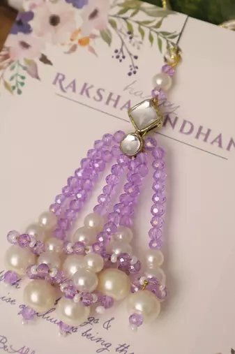 Lavender pearl tassel beaded designer lumba with roli chawal capsules