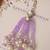 Lavender pearl tassel beaded designer lumba with roli chawal capsules