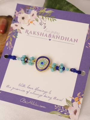 Blue evil eye beaded rakhi with roli chawal capsules 2
