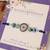 Blue evil eye beaded rakhi with roli chawal capsules