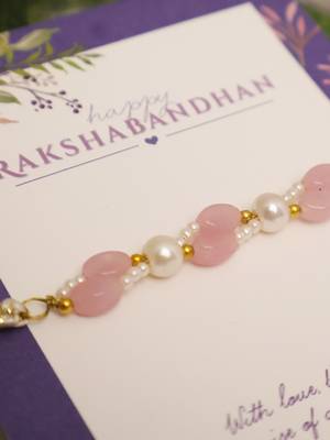 Pink pearl beaded designer rakhi with roli chawal capsules 4