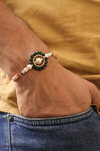 Green pearl floral beaded rakhi with roli chawal capsules