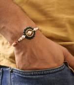 Green pearl floral beaded rakhi with roli chawal capsules