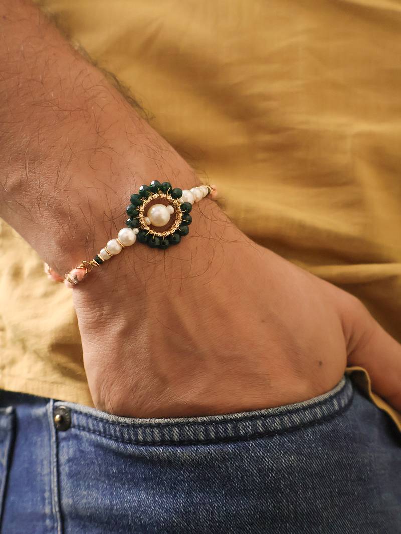 Green pearl floral beaded rakhi with roli chawal capsules