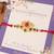 Lotus kundan stone designer rakhi with roli chawal capsules