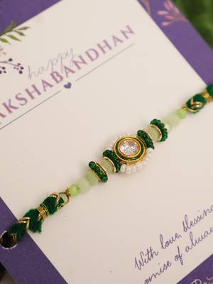 Green beaded floral charm rakhi with roli chawal capsules 4