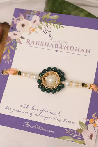 Green pearl floral beaded rakhi with roli chawal capsules