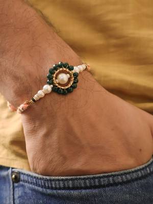 Green pearl floral beaded rakhi with roli chawal capsules 3