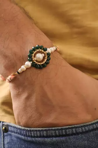 Green pearl floral beaded rakhi with roli chawal capsules